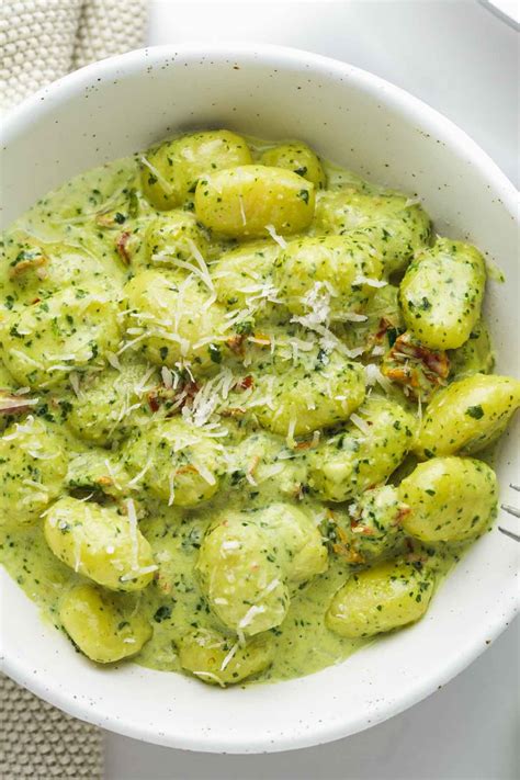 This 4-ingredient creamy pesto gnocchi dinner is a family-friendly vegetarian meal that you can ...