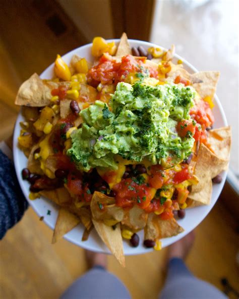 Loaded vegan nachos topped with guacamole : r/veganrecipes