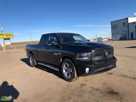 2015 Ram 1500 Sport 4x4 4dr Extended Cab Hemi - Michener Allen Auctioneering Ltd