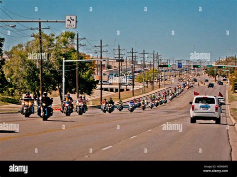FORT HOOD, Texas -- A long line of motorcycles winds up Tank Destroyer Boulevard at the end of ...