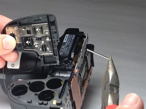 Nikon Coolpix L830 Battery Cover Replacement - iFixit Repair Guide