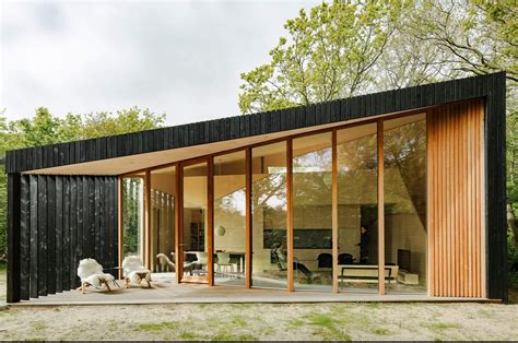 This prefab holiday home in Netherlands has transforming rooms that go ...