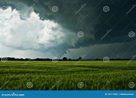 Thundery Clouds Over a Field Stock Photo - Image of rural, dark: 14711002