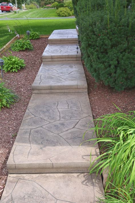 Stamped concrete steps | Lawn and garden, Front walkway, Concrete path