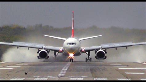 Turkish Airline A330 - Awesome reverse thrust after wet & windy landing in DUS at runway 23R ...
