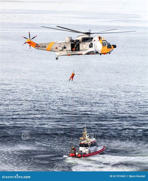 Rescue helicopter editorial photography. Image of lift - 61191842