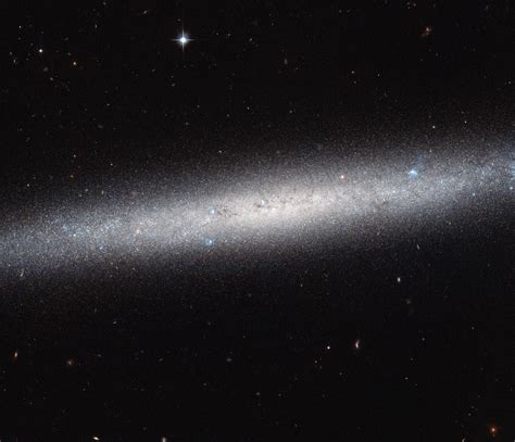 Hubble Sees Edge-On Spiral Galaxy NGC 5023 | Sci.News