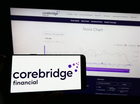 Person Holding Mobile Phone with Logo of American Company Corebridge Financial Inc. on Screen in ...