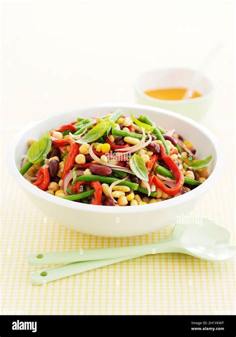 Mixed bean salad with tomato dressing Stock Photo - Alamy