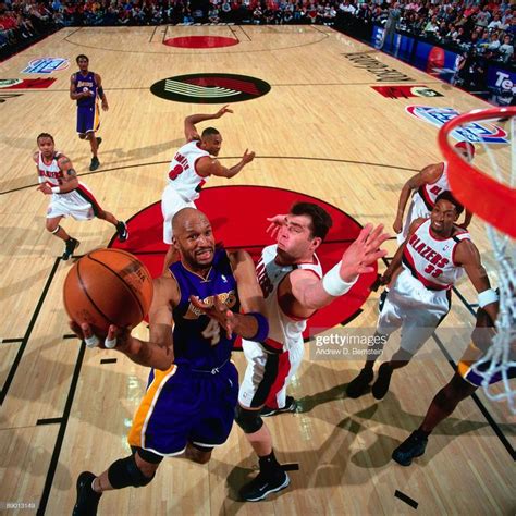 basketball players in action on the court during a game