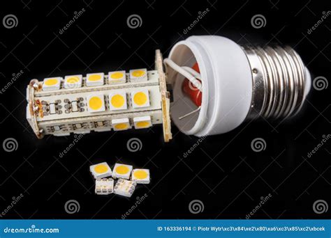 Broken Led Bulb on a Dark Table. Modern Lighting Under Repair Stock Photo - Image of concept ...