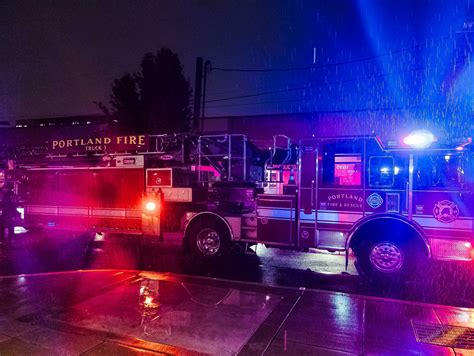 Portland, Oregon, USA - 11.02.2023 Fire truck with flashing lights at night, called to a fire ...