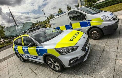 Two Greater Manchester Police vehicles photographed at Central Park ...