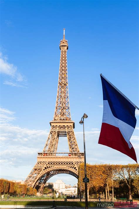 - Eiffel tower and french flag, Paris, France | Royalty Free Image