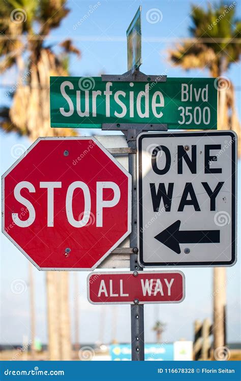 Traffic Signs, Stop All Way And One Way, And Surfside Blvd Sign Stock ...