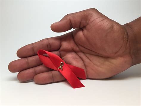 HIV Awareness Ribbon | An HIV awareness ribbon in a person's… | Flickr