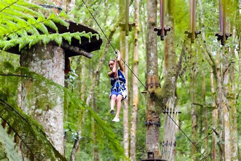 A girl descends a zipline at a Treetop Adventure Park, Bali, Indonesia Stock Photography, Travel ...