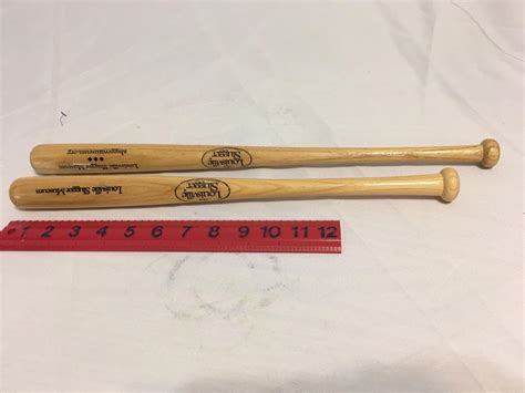 Miniature Louisville Slugger Bats | EstateSales.org