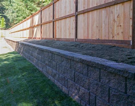 We set the fence back 3 feet from the retaining wall to create a 3 foot ...