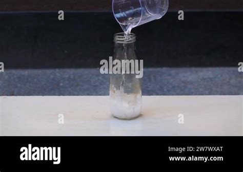 Potassium Permanganate Hydrogen Peroxide Decomposition Reaction. Smoke effect from the chemical ...