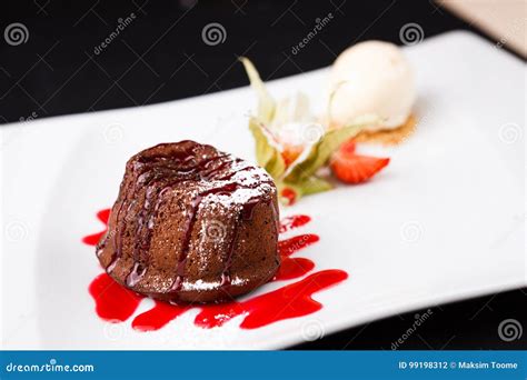 Chocolate Fondant with Ice Cream Stock Photo - Image of brown, ingredient: 99198312