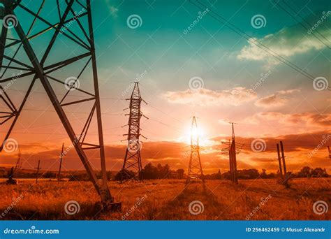 Tower and High Voltage Power Line at Sunset. Stock Image - Image of ...