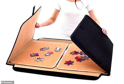 This foldable jigsaw mat is perfect for working on puzzles when stuck ...