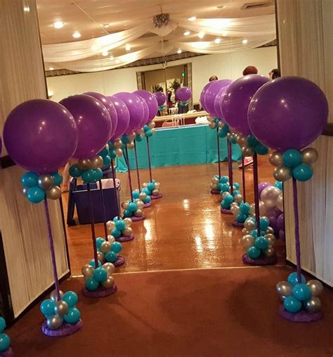 Silver, Purple and Teal Balloon Topiaries lined up along the entrance to the venue. | Globos ...