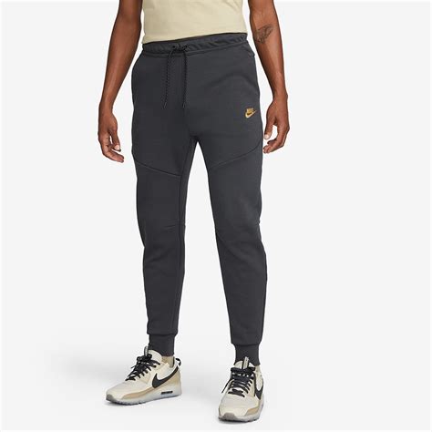 Nike Sportswear Tech Fleece Joggers - Dark Smoke Grey/Metallic Gold ...