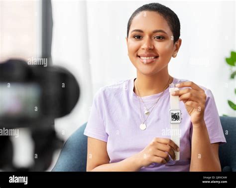 female blogger showing smart watch with qr code Stock Photo - Alamy
