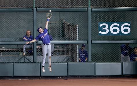 Rangers shut out Astros in Game 1 of ALCS, Evan Carter makes game-changing catch and double play ...