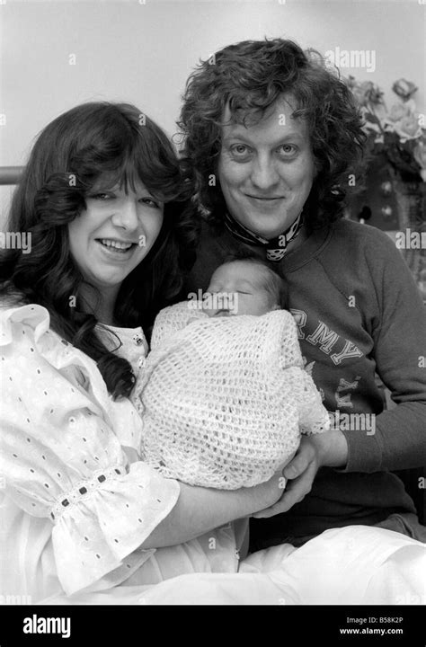 Pop Singer: Slade: Noddy In Wonderland: Noddy Holder with his wife Leeanra, 23 and their baby ...