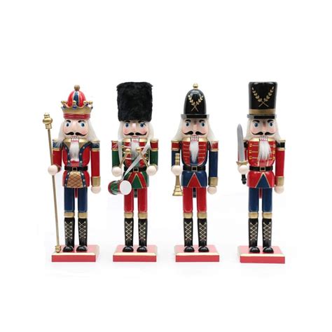 four wooden nutcrackers are lined up