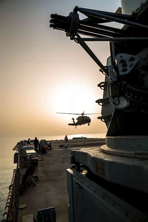 A deck hand on the RFA Cardigan Bay, Royal Fleet Auxiliary, - NARA ...