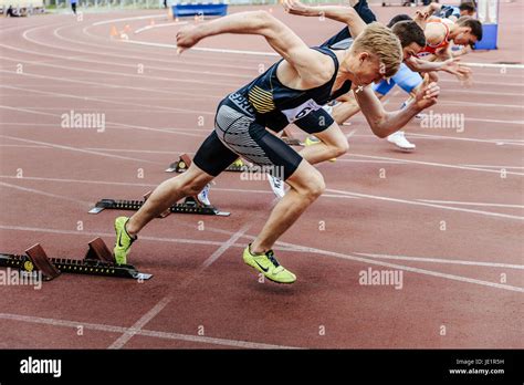 start sprinters runners men running 100 meters during UrFO Championship in athletics Stock Photo ...