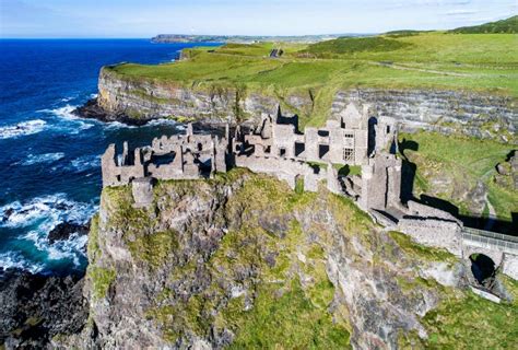 Ruins of Dunluce Castle in Northern Ireland, UK Stock Photo - Image of ...