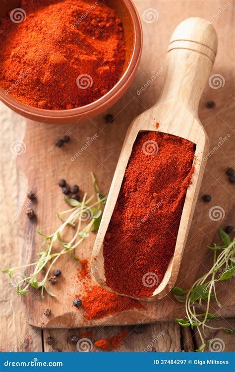 Red Ground Paprika Spice in Wooden Scoop and Bowl Stock Image - Image ...