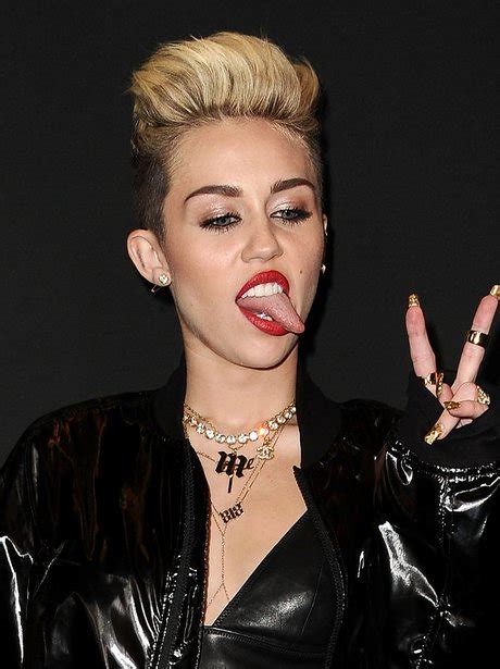 Miley Cyrus Faces: 30 Pictures Of Miley Sticking Her Tongue Out - Capital