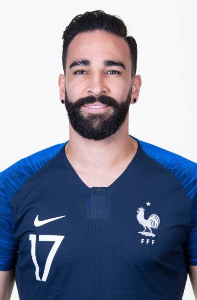 Adil Rami of France poses for a portrait during the official FIFA... | Equipo de francia ...