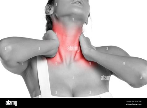 woman massaging her sore neck on a white background Stock Photo - Alamy