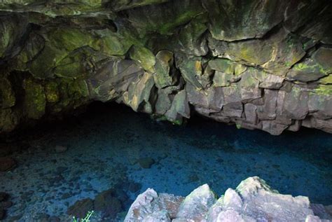 Waianapanapa caves on Maui. I've been swimming in here a few times. FREEZING COLD. But it's so ...