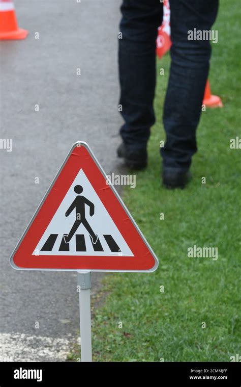 pedestrian traffic sign on the street Stock Photo - Alamy