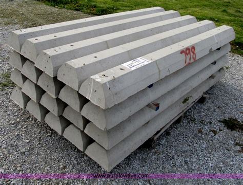 (20) concrete parking stops in Troy, MO | Item B2696 sold | Purple Wave