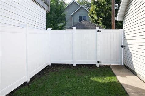 Our New White Vinyl Fence - Before + After | The DIY Playbook