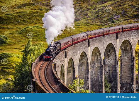 Glenfinnan Railway Viaduct in Scotland with a Steam Train Editorial ...