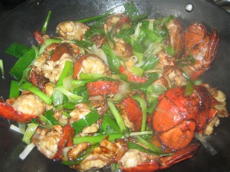 Lobster Chinese style... stir fried with ginger and spring onions ...