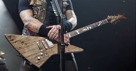 James Hetfield of Metallica's newest guitar. It is made of reclaimed ...