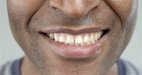 Extreme Close-Up of a Smile of an Afro-American Man/The African ...