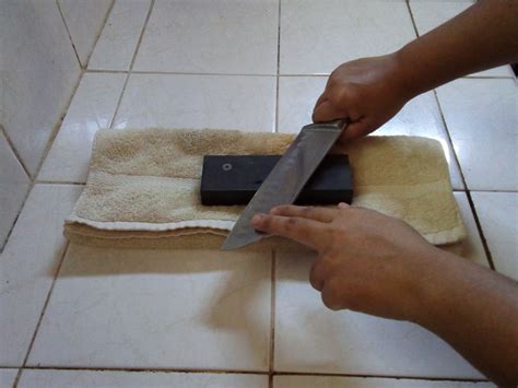 How to Sharpen a Knife With a Stone | Delishably