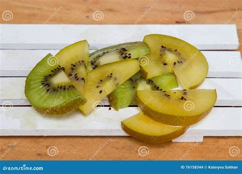 Green kiwi. Yellow Kiwi stock photo. Image of fruit, health - 76158344